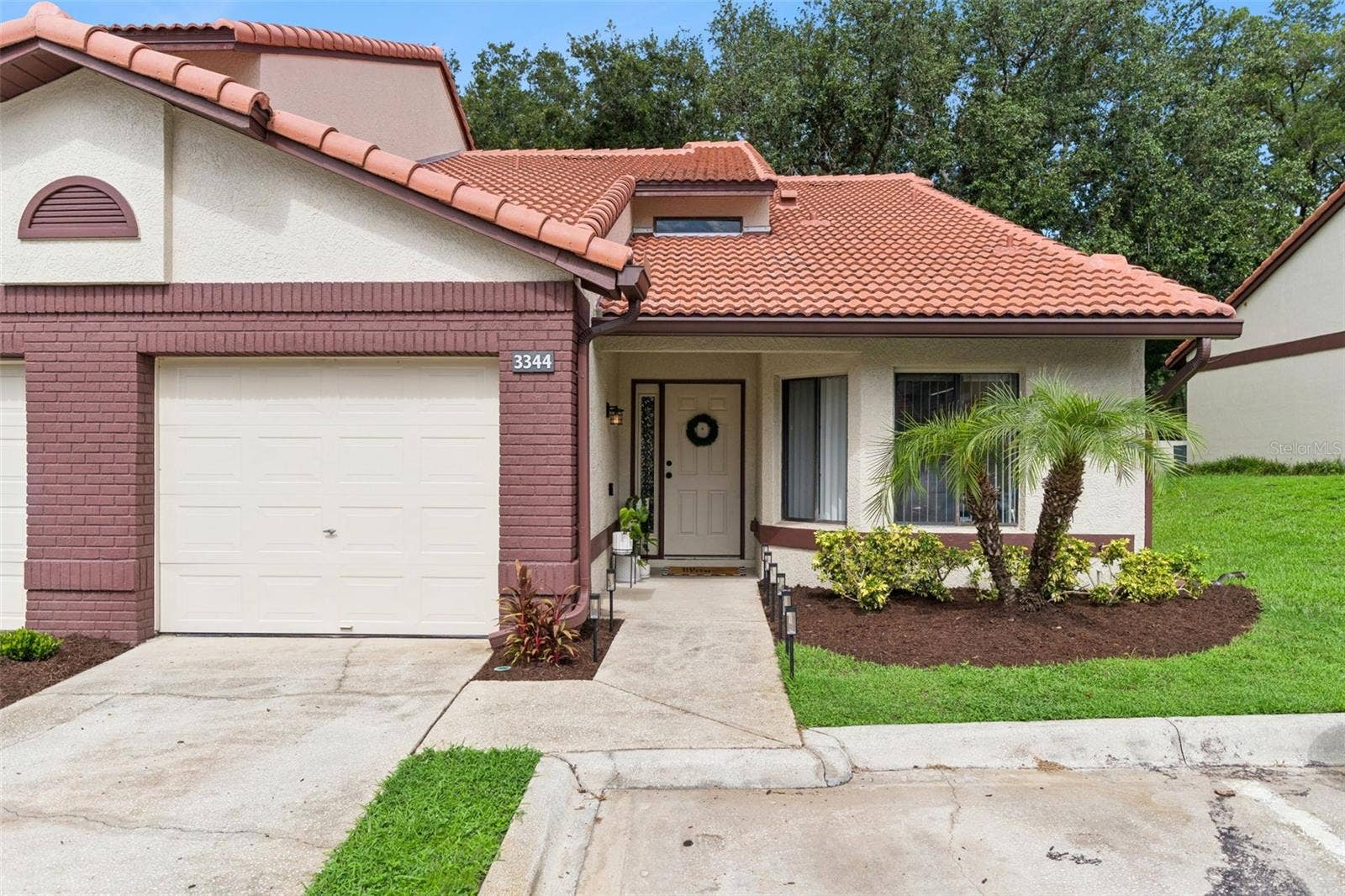 3344 GRAY FOX COVE, #4, Apopka, FL 32703 Beautiful Mediterranean-style condo with an attached garage, mature landscaping, and low-maintenance living in the desirable Foxwood community of Apopka. Completely move-in ready with beautifully updated interiors.