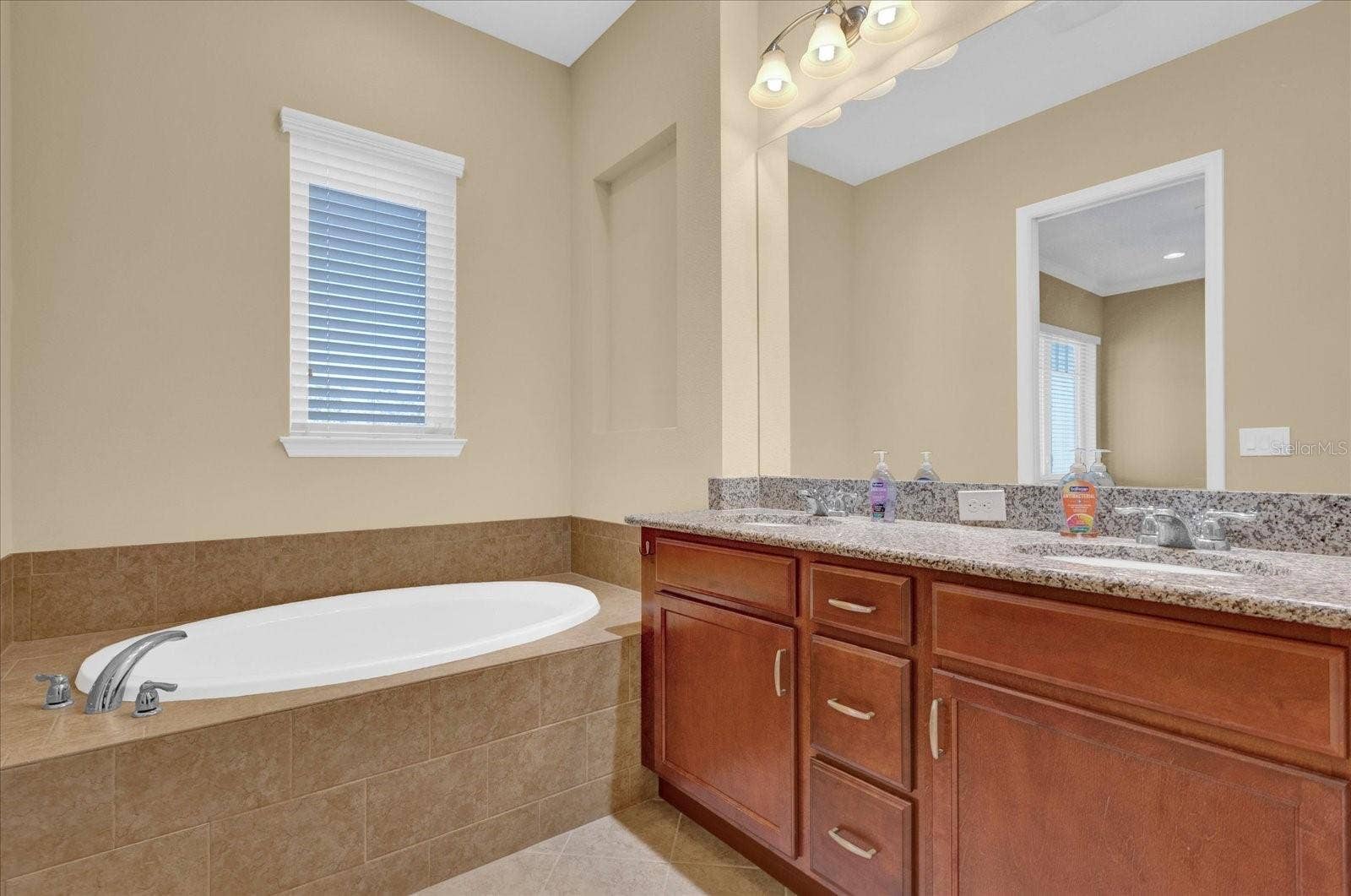 Spa-inspired primary bath featuring a relaxing garden soaking tub.