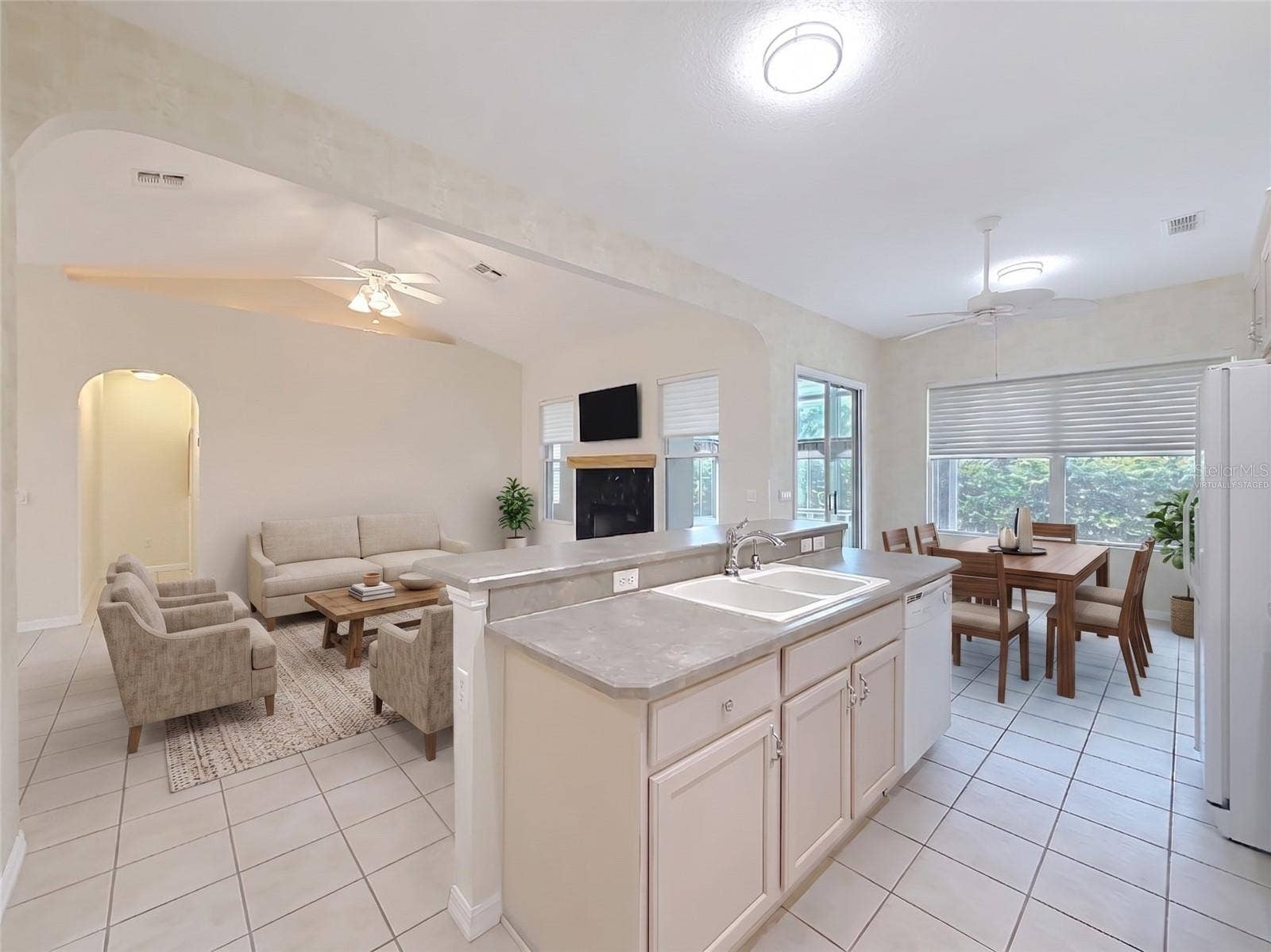 Kitchen, Family room and dinette. Virtually Staged