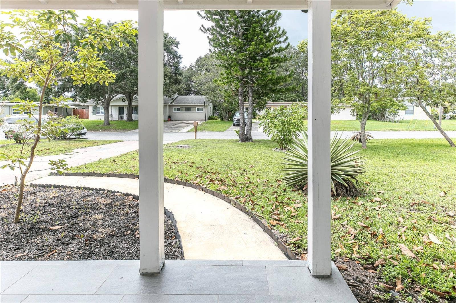 1842 PURITAN AVENUE, Winter Park, FL 32792 street view from front entrance