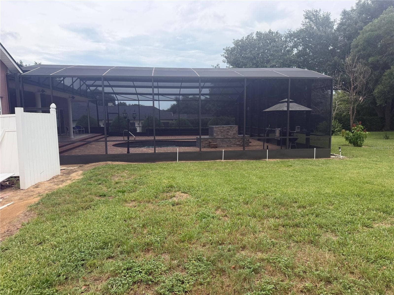 1760 LAKE TERRACE DR, Eustis, FL 32726 out side pool gage