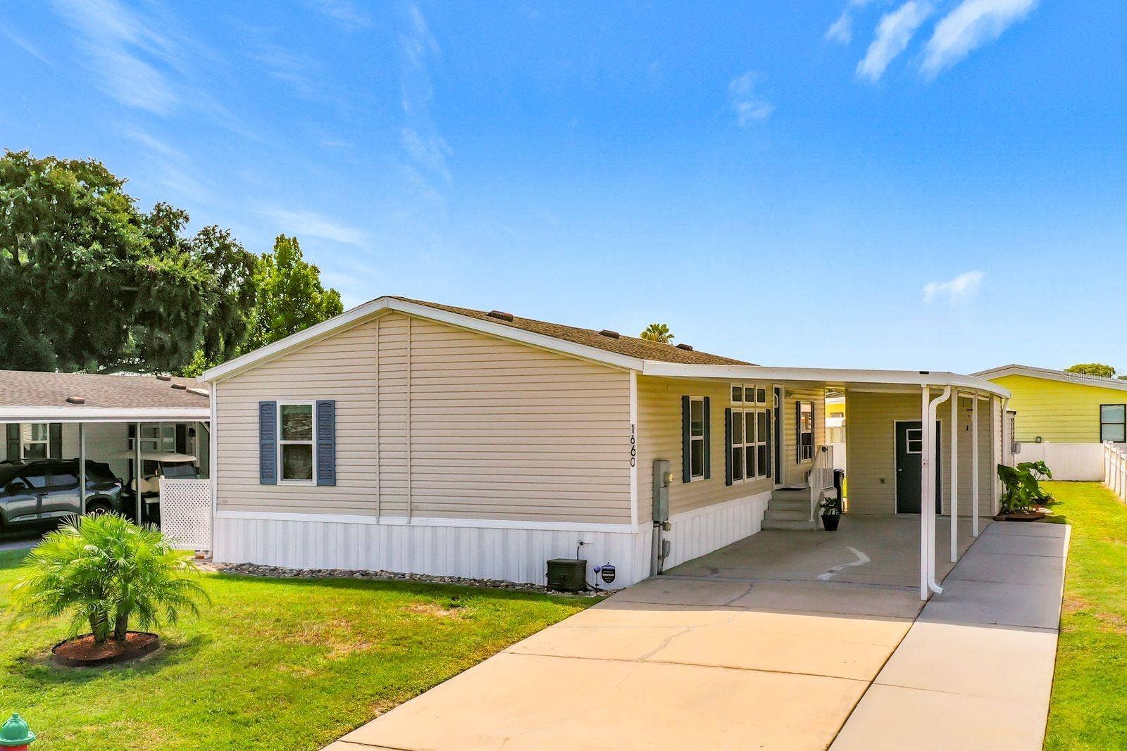 1660 ELKHART CIRCLE, Tavares, FL 32778 Front of the house