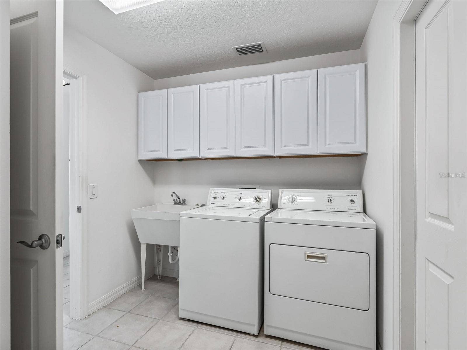 764 BAISLEY TRAIL, The Villages, FL 32162 Laundry Room