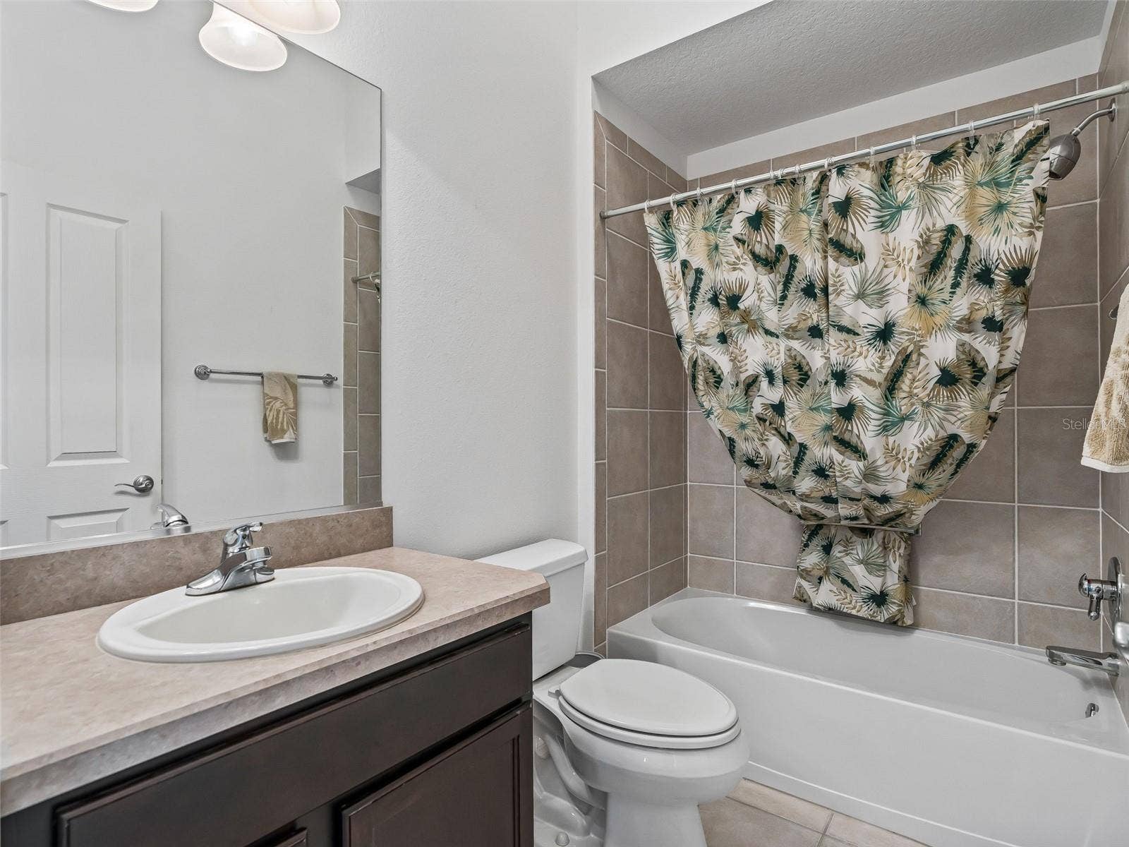 764 BAISLEY TRAIL, The Villages, FL 32162 Guest Bath with shower tub combo