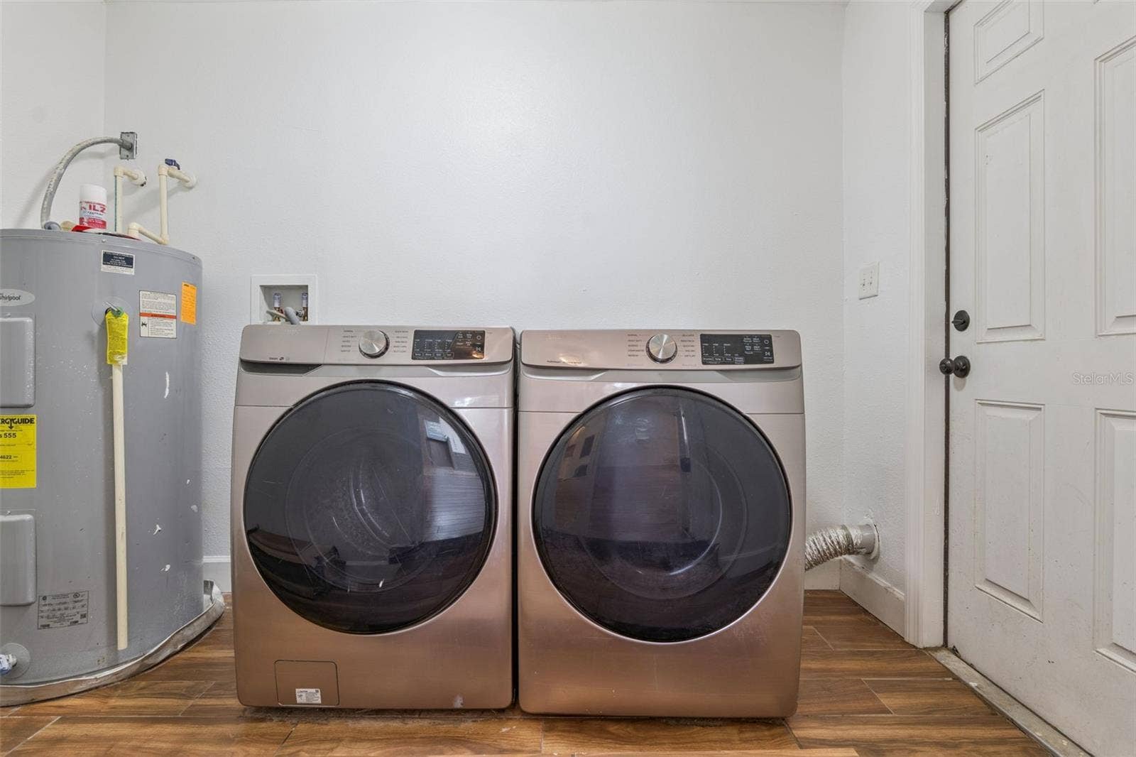306 S DISSTON AVENUE, Minneola, FL 34715 Washer & Dryer on 1st Floor after the Dining Area.