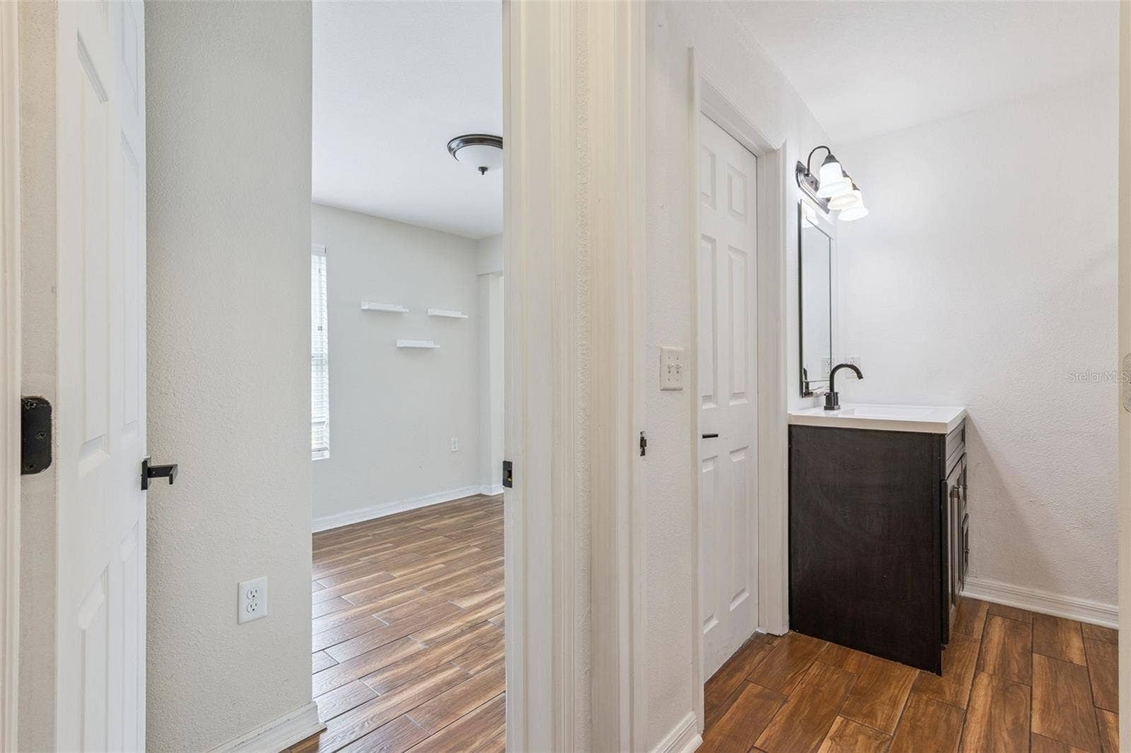 306 S DISSTON AVENUE, Minneola, FL 34715 Entryway to Primary Bedroom & Bathroom