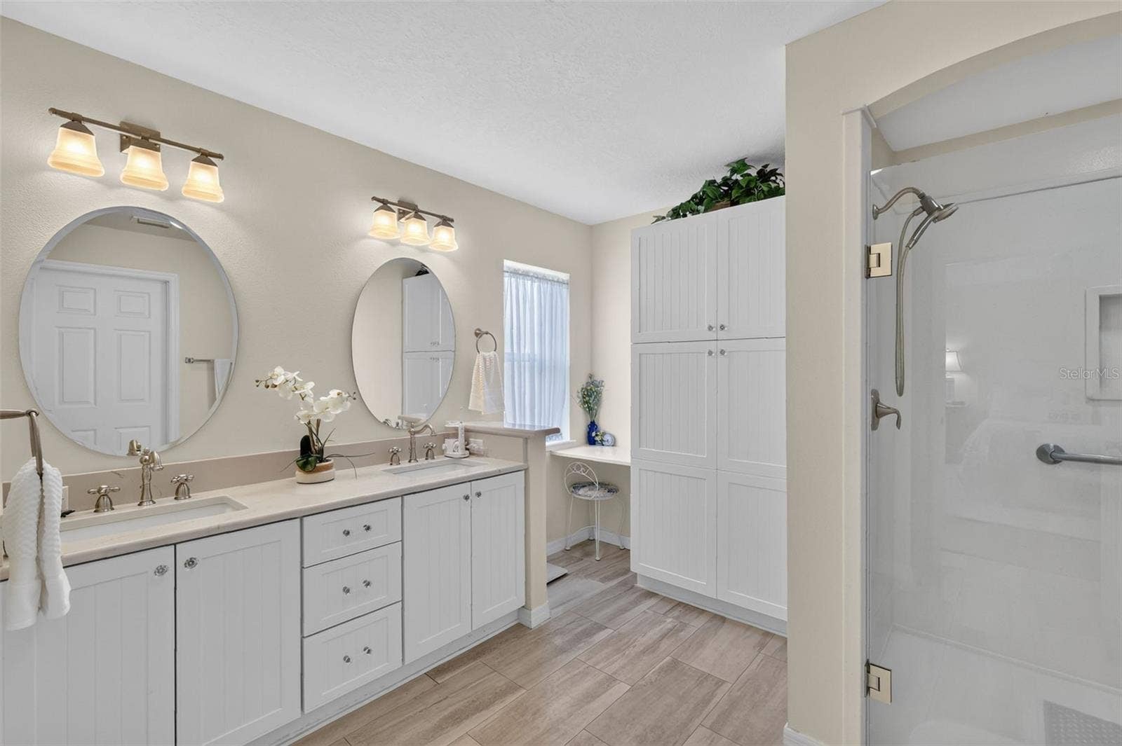 1218 CAMERO DRIVE, Lady Lake, FL 32159 Double sink vanity with linen closet and walk in shower