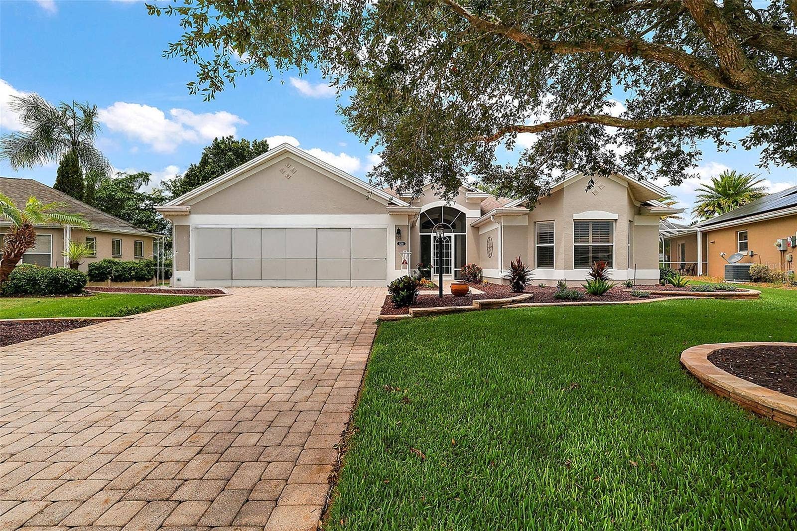 1218 CAMERO DRIVE, Lady Lake, FL 32159 BOND PAID! Welcome to this BEAUTIFULLY UPDATED 3-bedroom, 2-bath LANTANA Designer featuring a SWIM SPA in the desirable Village of Santo Domingo