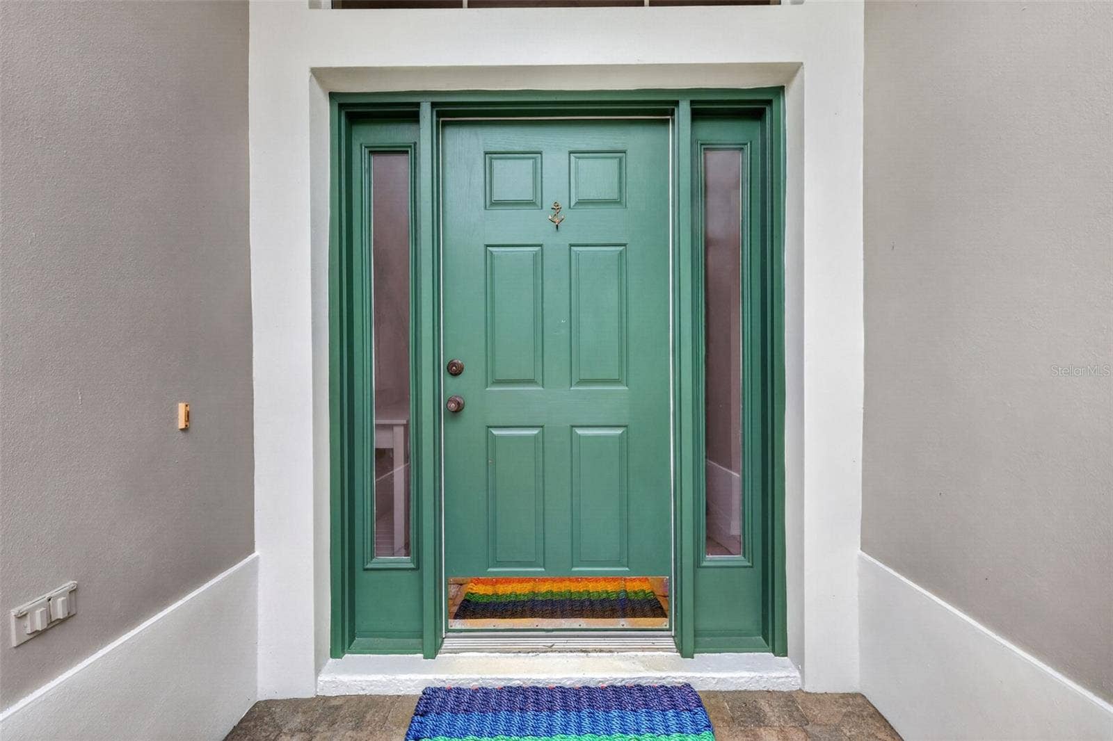 1218 CAMERO DRIVE, Lady Lake, FL 32159 Front door with side lites and transom window