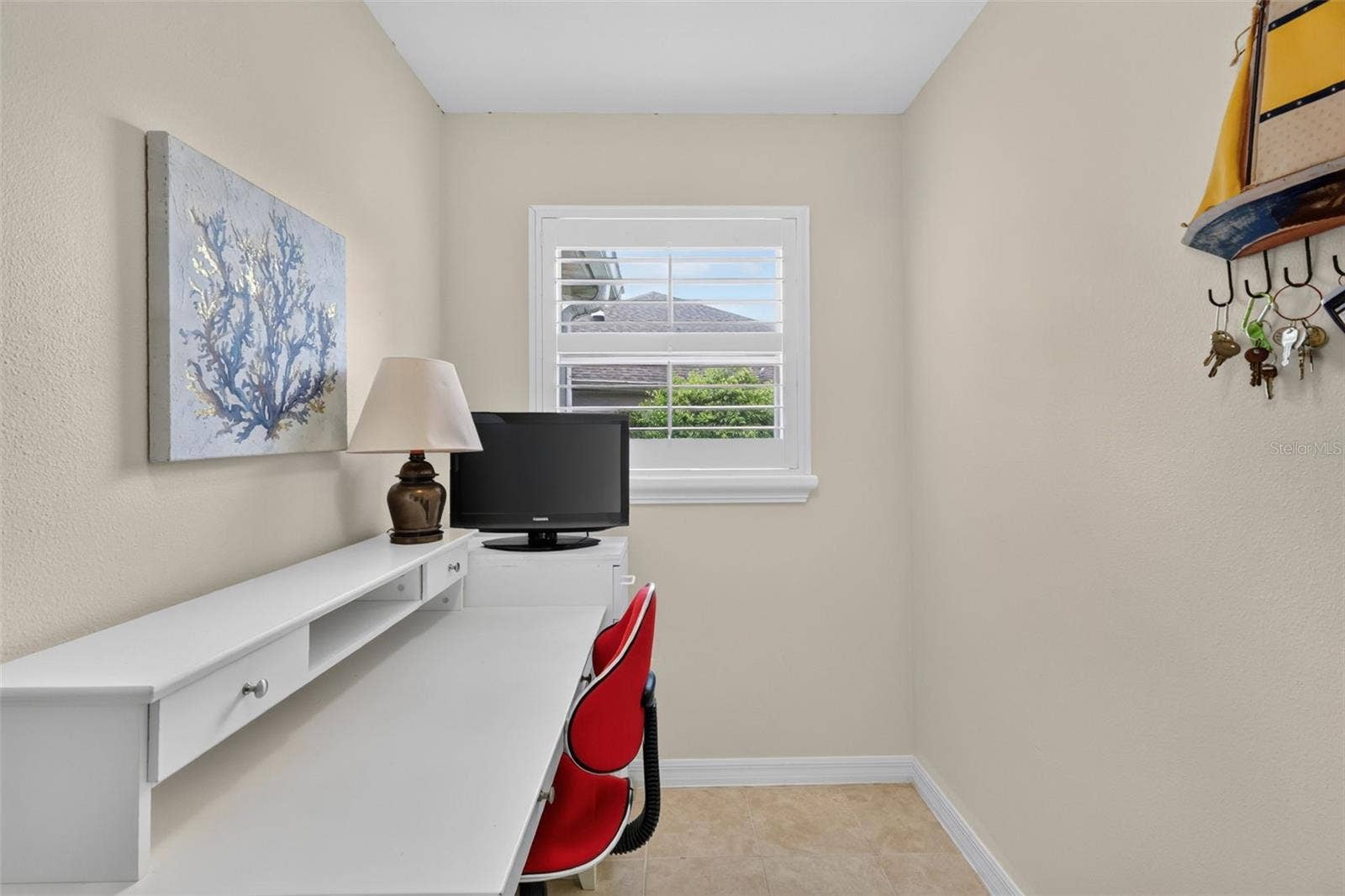 1218 CAMERO DRIVE, Lady Lake, FL 32159 Desk area within the laundry room