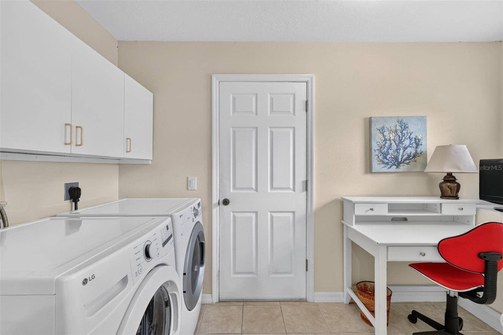 1218 CAMERO DRIVE, Lady Lake, FL 32159 Large laundry room with plenty of storage