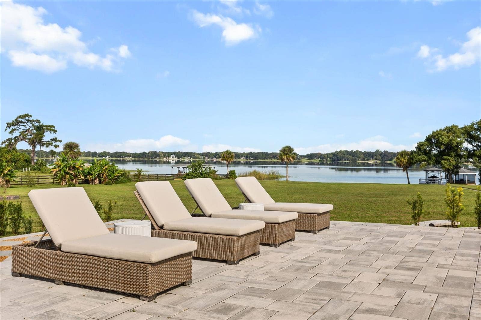 Lounging by pool with Lake Ola in view