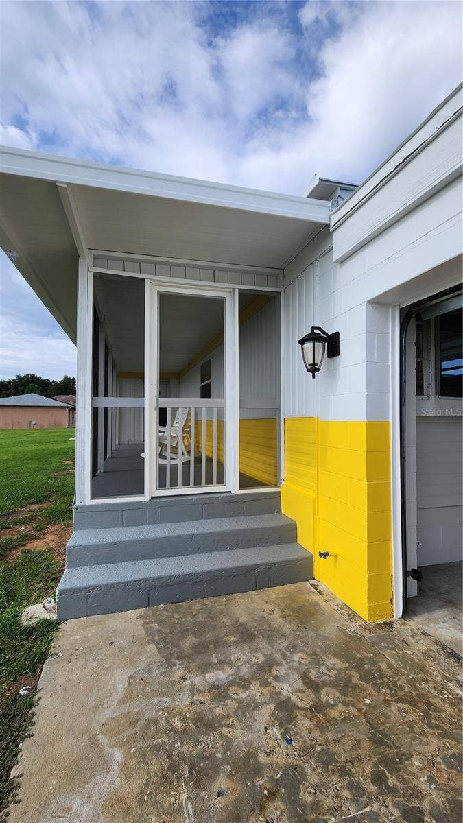 17653 BROAD STREET, Montverde, FL 34756 Front steps to enter home