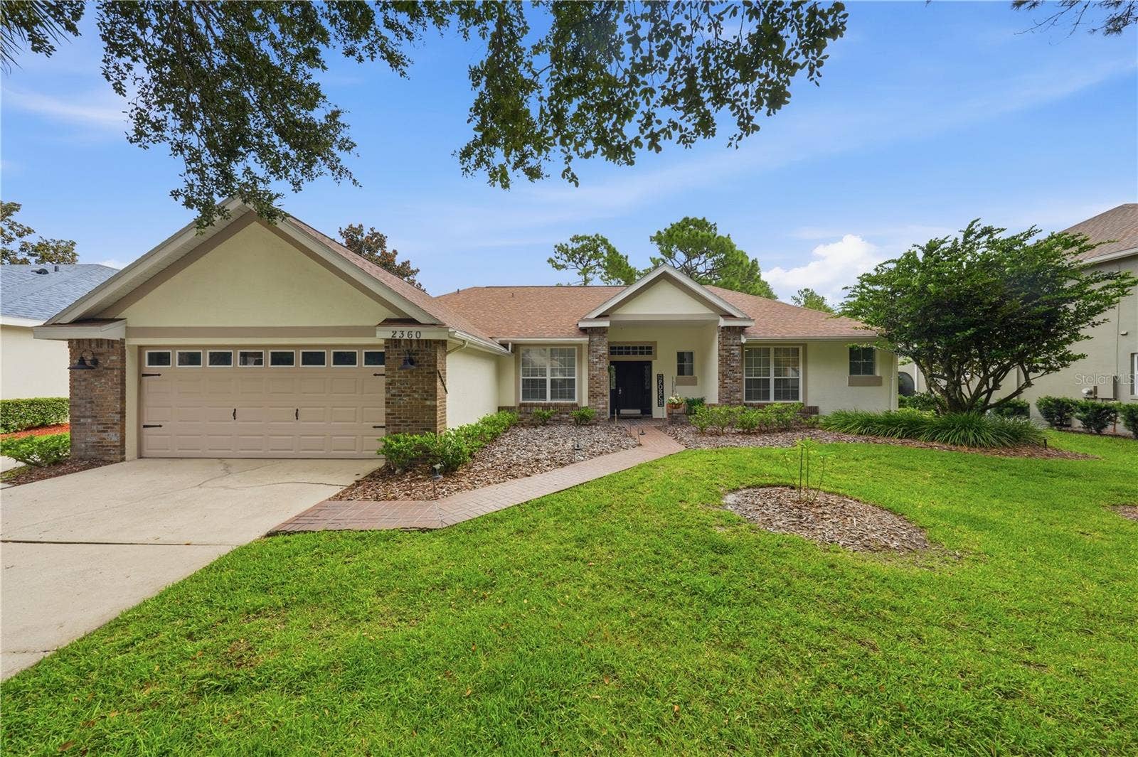 2360 PARK FOREST BOULEVARD, Mount Dora, FL 32757 HOA-maintained landscaping means less work and more time to enjoy the community park and playground.