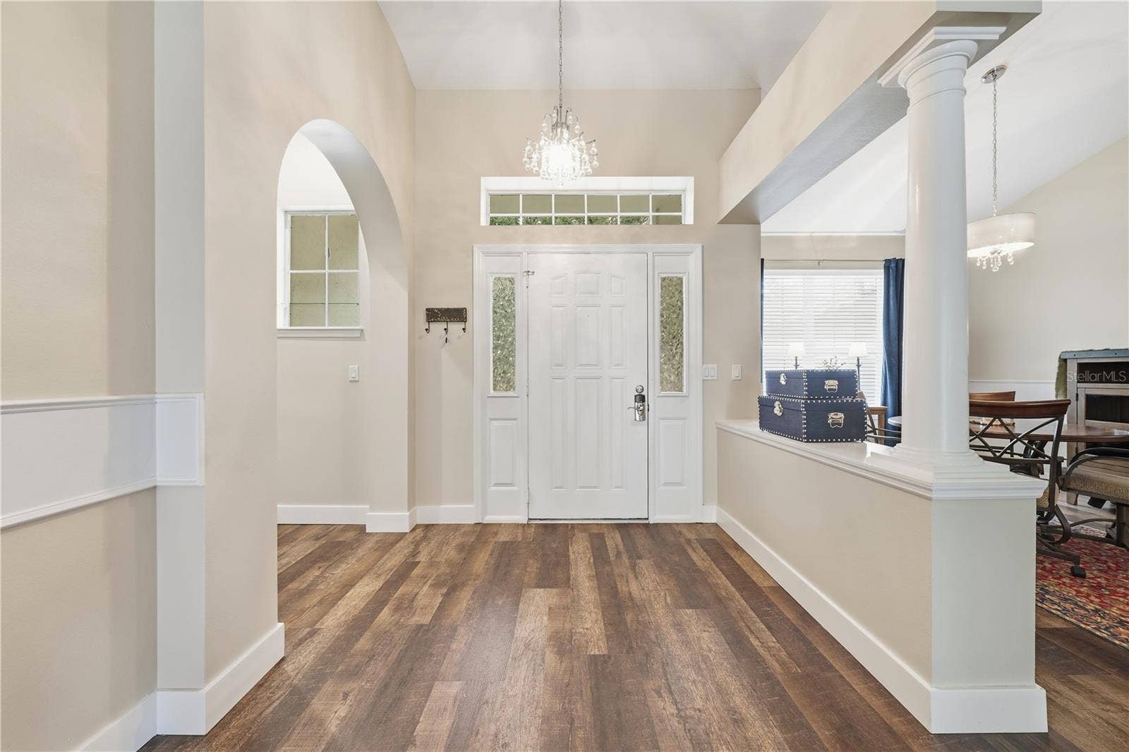 2360 PARK FOREST BOULEVARD, Mount Dora, FL 32757 A warm welcome begins the moment you step inside the foyer with crystal light fixture.