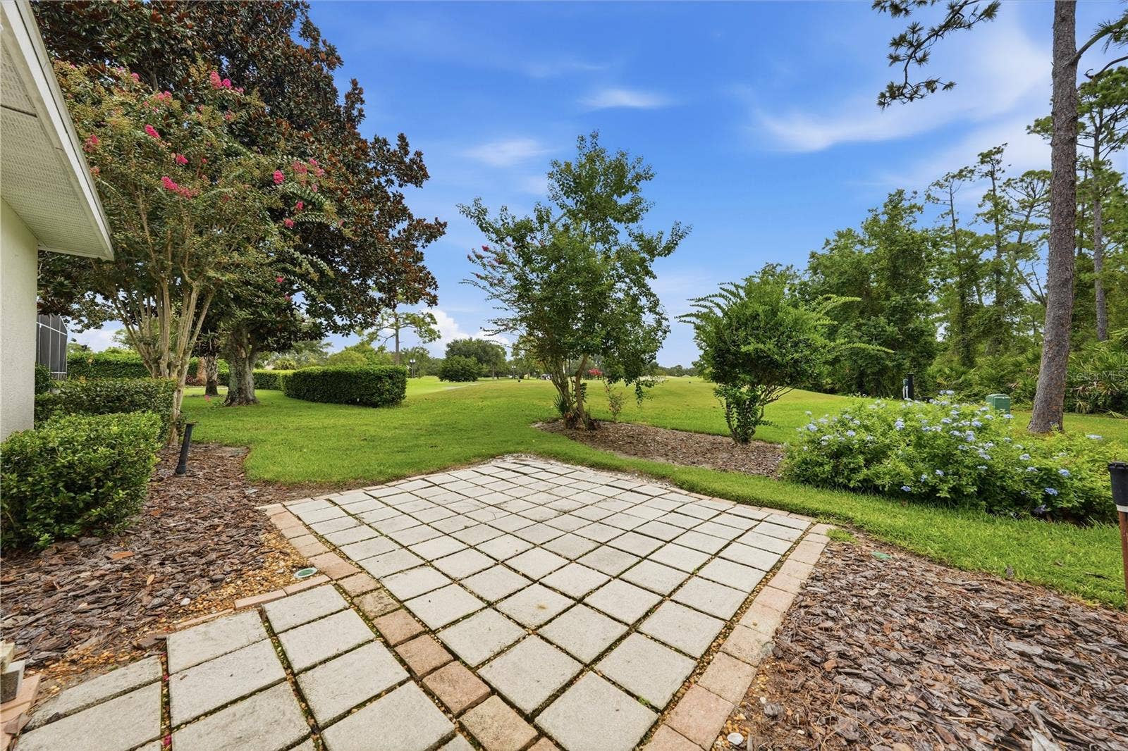 2360 PARK FOREST BOULEVARD, Mount Dora, FL 32757 Unwind with serene views overlooking the 8th tee.