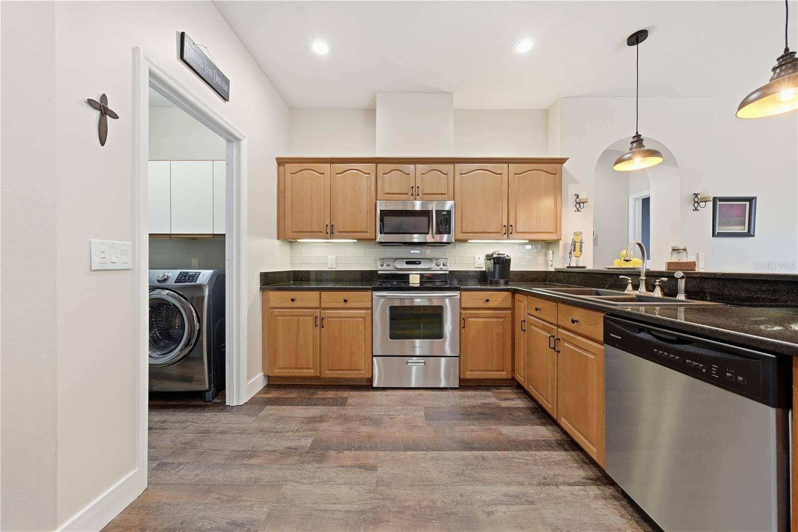 2360 PARK FOREST BOULEVARD, Mount Dora, FL 32757 Kitchen is in the heart of the home and designed for both function and style.