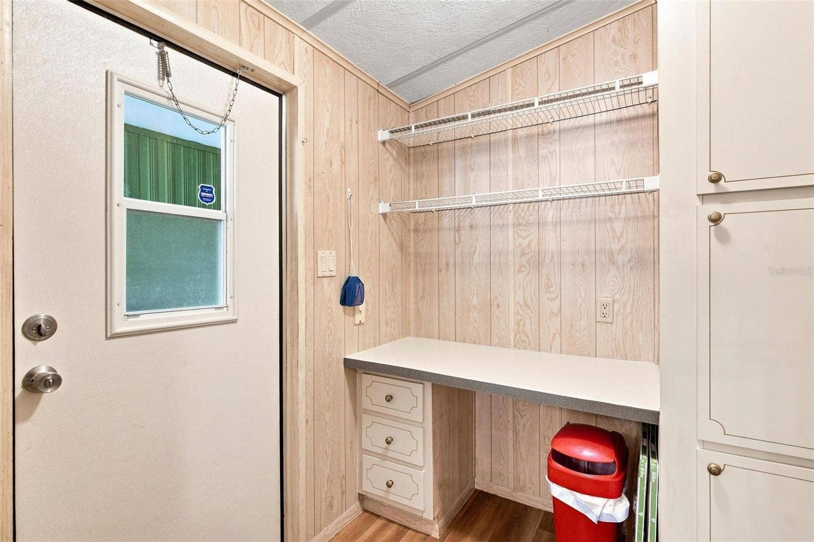 Built in desk by back door.