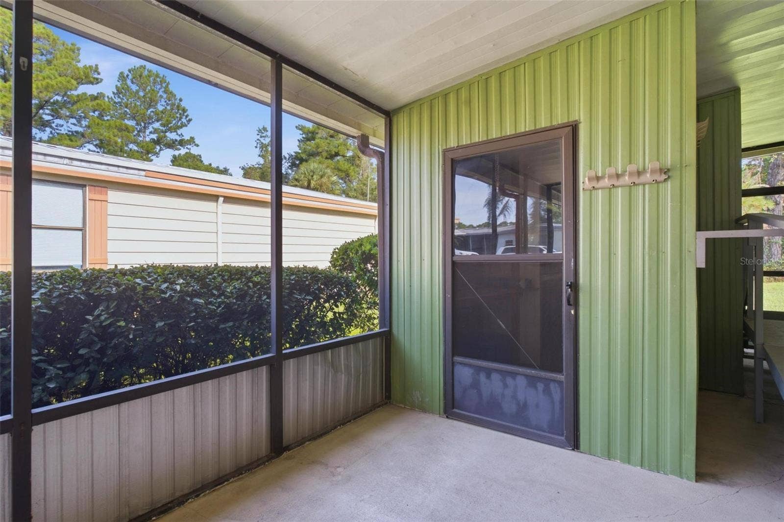 Screen porch, door to utility room