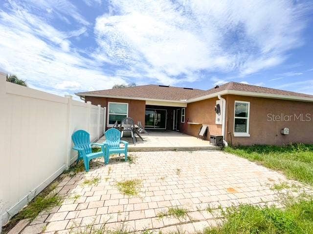 309 GENTLE BREEZE DRIVE, Minneola, FL 34715 rear
