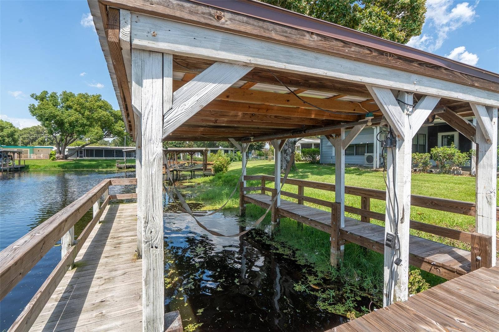 1021 HILLTOP ROAD, Tavares, FL 32778 Covered dock with lift