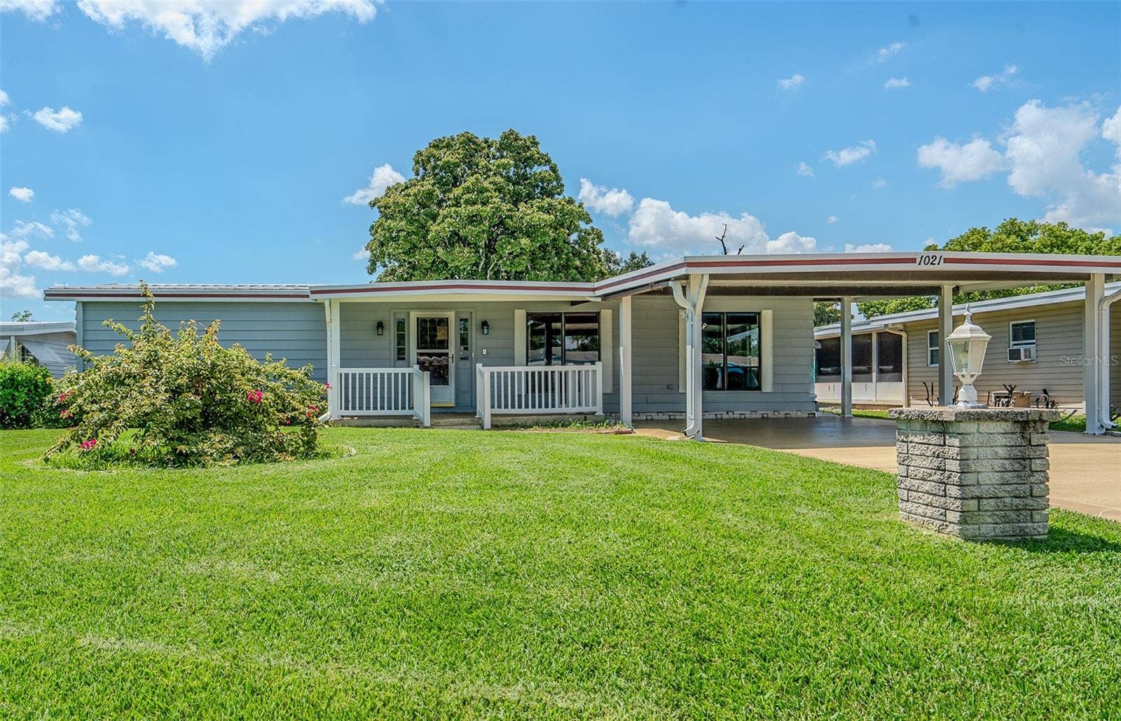 1021 HILLTOP ROAD, Tavares, FL 32778 Front