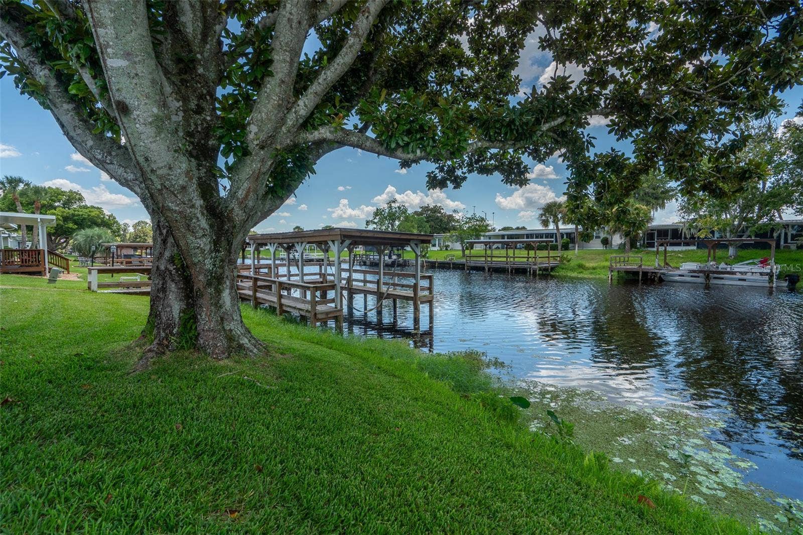 1021 HILLTOP ROAD, Tavares, FL 32778 Rear Canal View