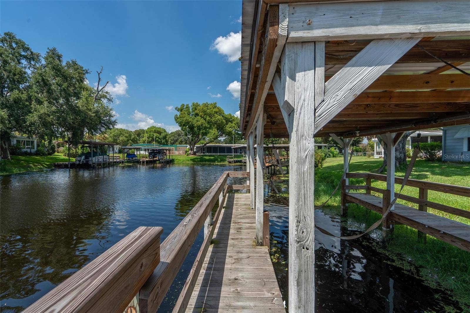 1021 HILLTOP ROAD, Tavares, FL 32778 Canal View