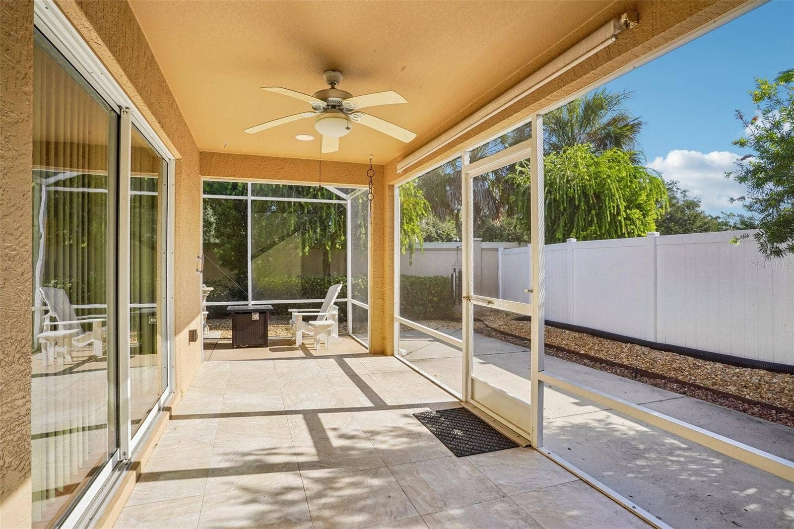 583 ARTEAGA WAY, The Villages, FL 32162 Half of the Enclosed Lanai