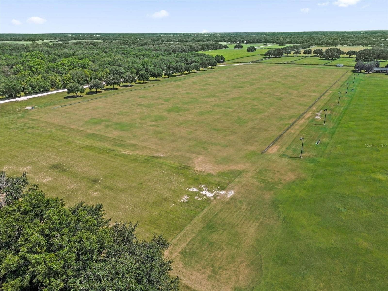 2801 BARBOZA DRIVE, The Villages, FL 32162 Drone of the polo field behind
