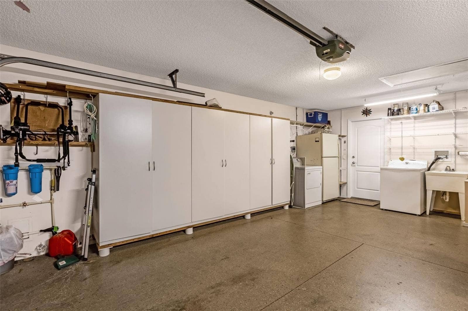 2801 BARBOZA DRIVE, The Villages, FL 32162 Garage with plenty of storage