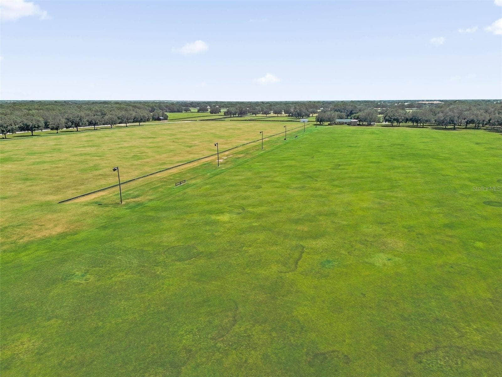 2801 BARBOZA DRIVE, The Villages, FL 32162 Drone of the polo field behind
