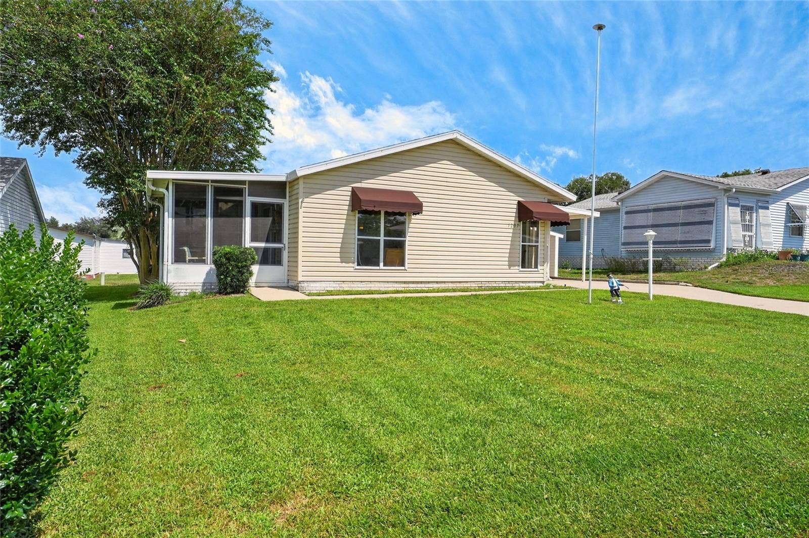 1207 PALMETTO DRIVE, The Villages, FL 32159 Nice Front/Side Lanai