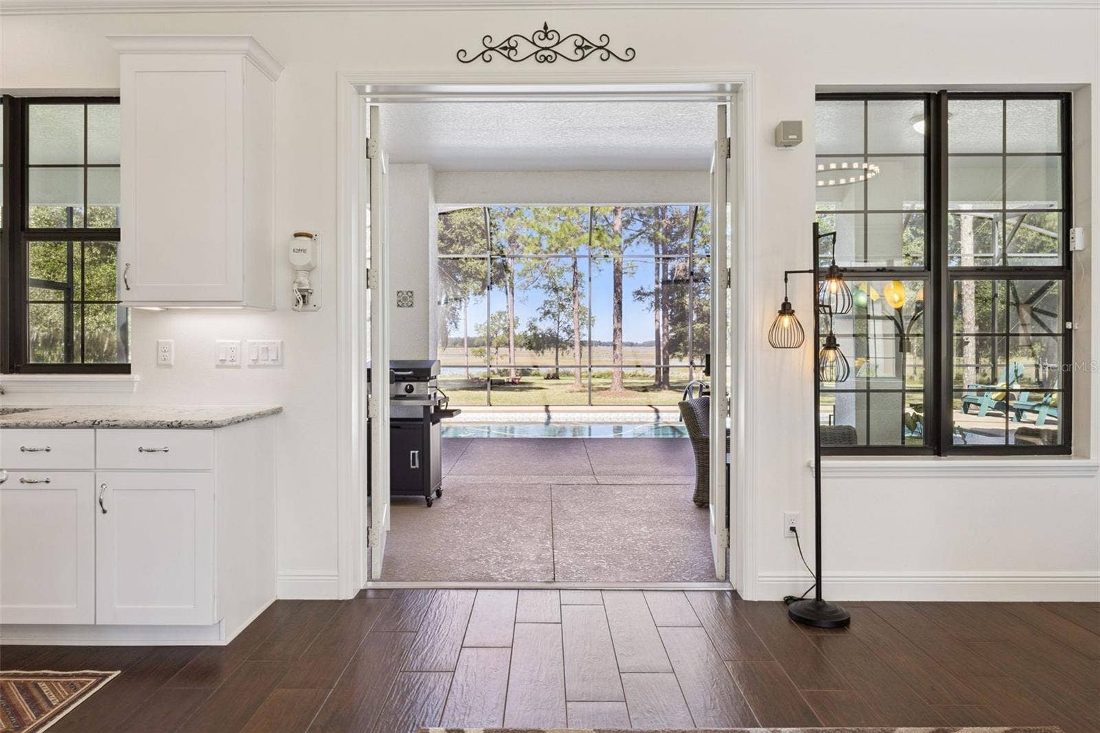 24871 BONSMARA DRIVE, Groveland, FL 34736 French Doors lead out to the Pool Lanai