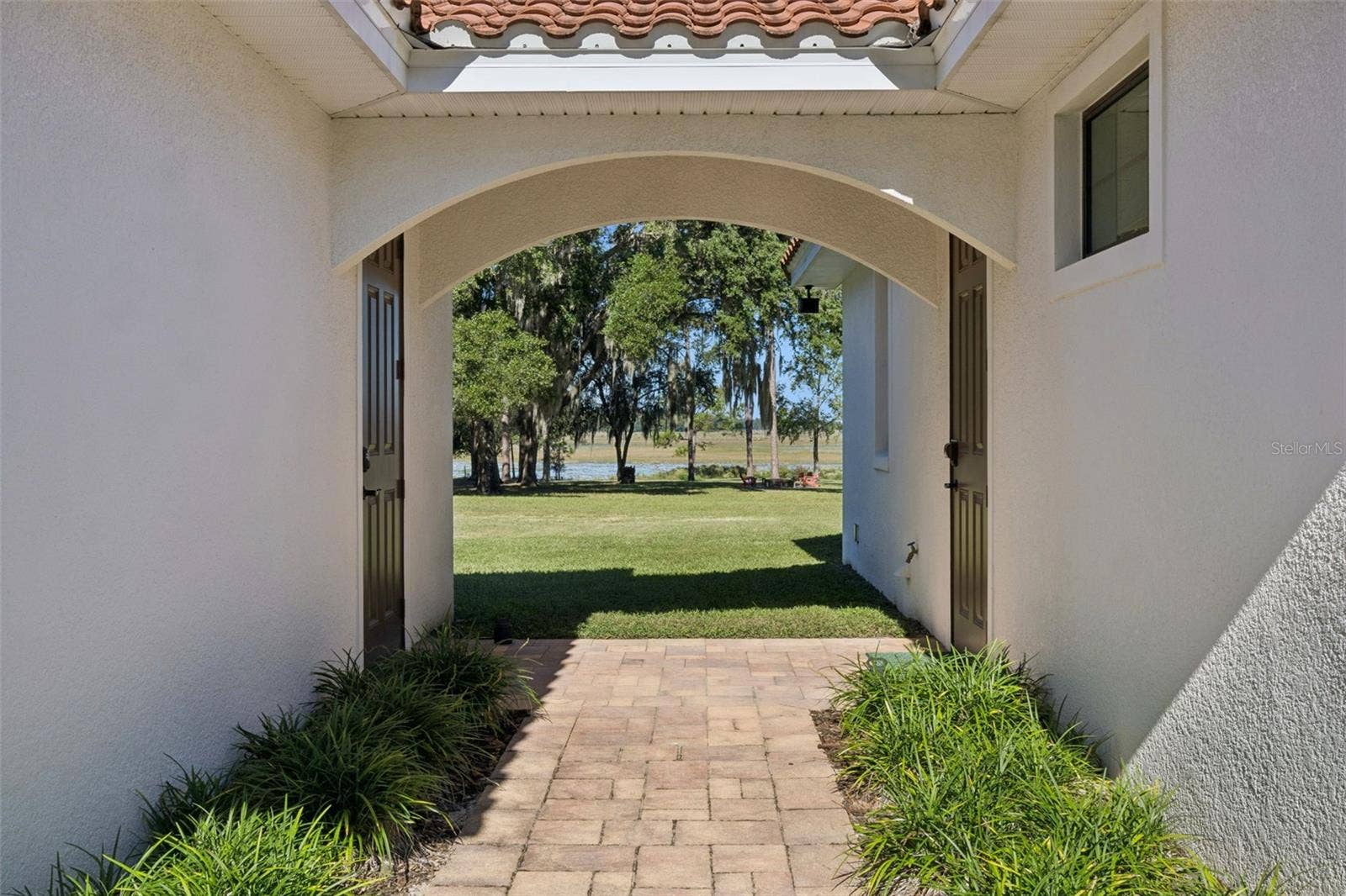 24871 BONSMARA DRIVE, Groveland, FL 34736 Breezeway Between House & Garage