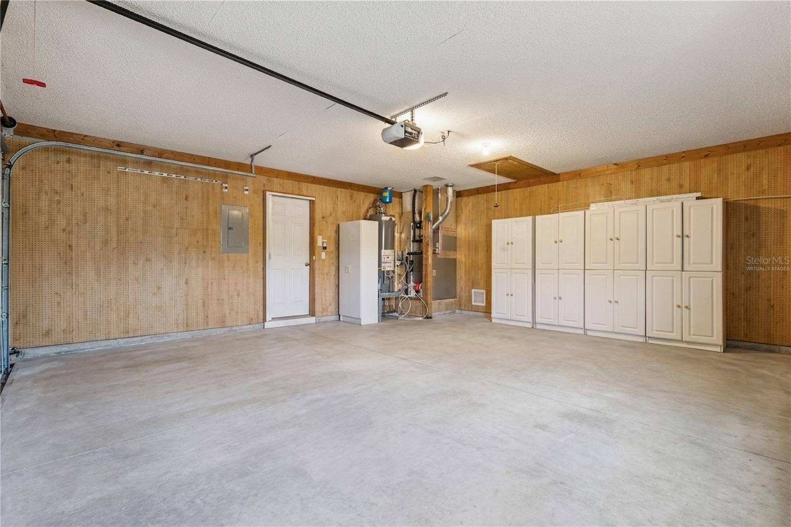 26744 RACQUET CIRCLE, Leesburg, FL 34748 Rear of Garage - Virtually Staged
