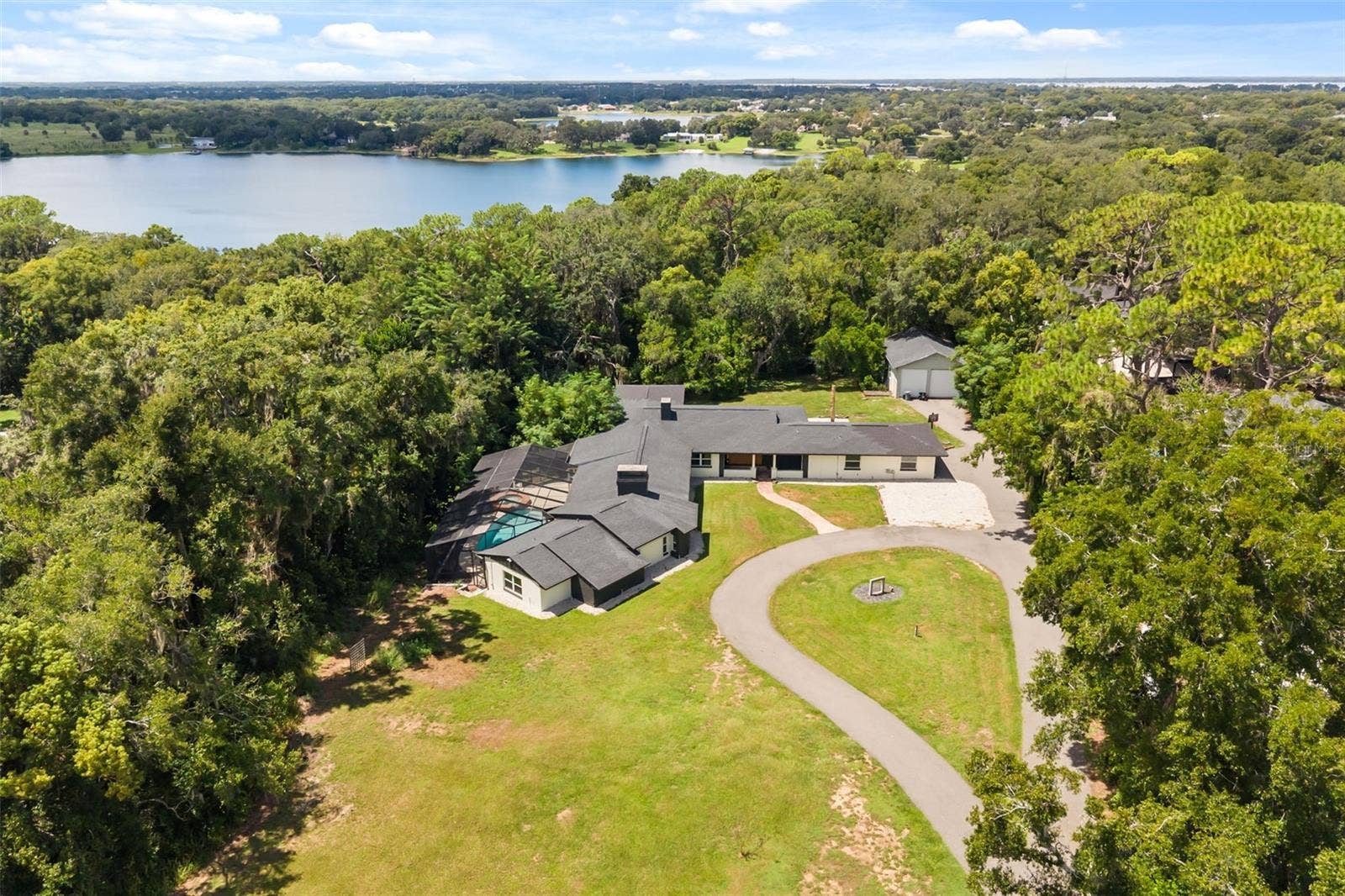 Aerial of property with East Crooked Lake in view