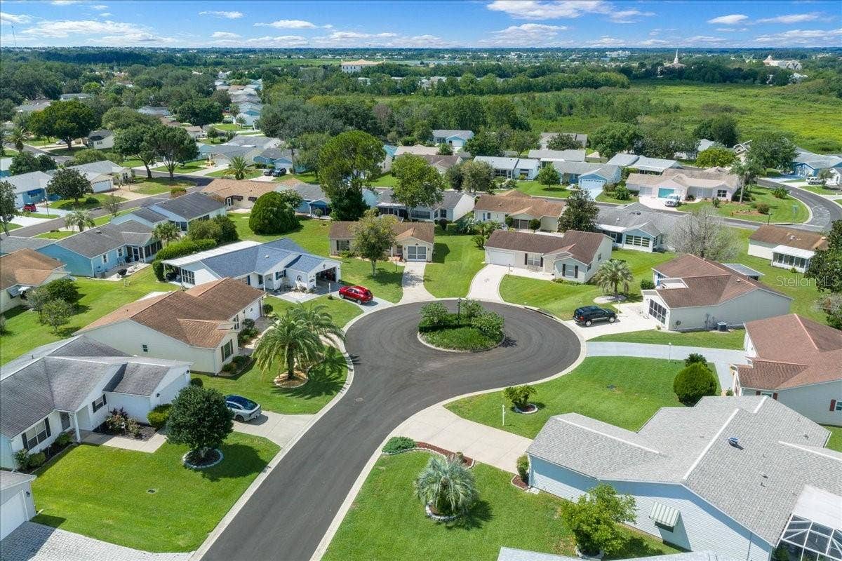 1410 SANCHEZ COURT, The Villages, FL 32159 Tucked in The Village of Rio Ponderosa