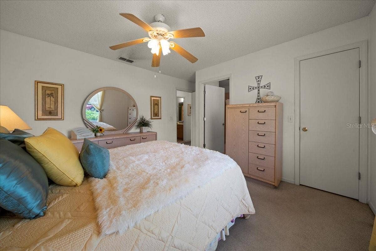 1410 SANCHEZ COURT, The Villages, FL 32159 Ceiling Fan in Primary Bedroom