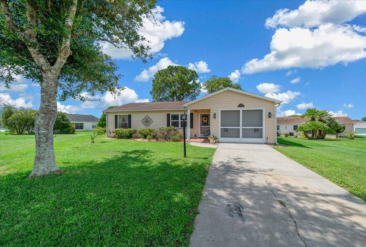 1410 SANCHEZ COURT, The Villages, FL 32159 Beautiful Tree Provides Shade in Front Yard