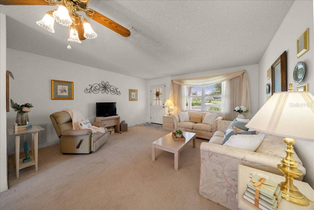 1410 SANCHEZ COURT, The Villages, FL 32159 Ceiling Fan in Living Room