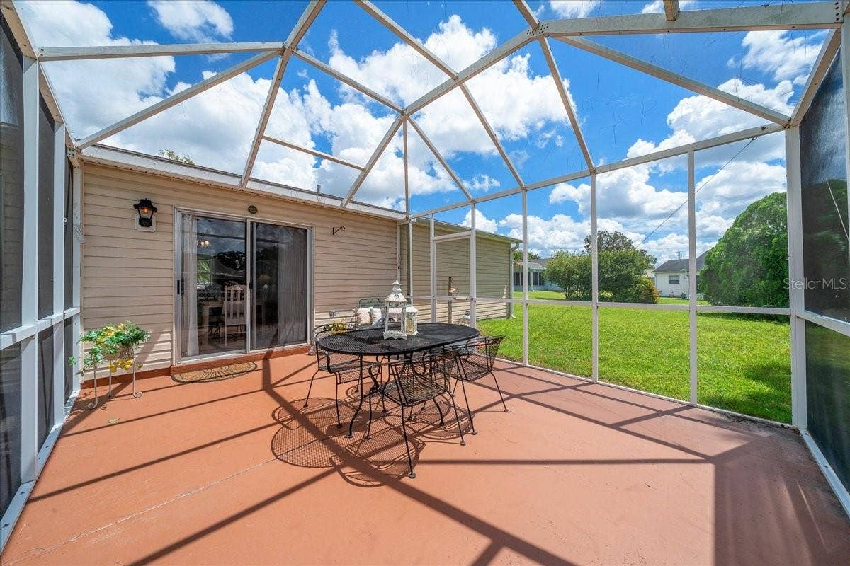 1410 SANCHEZ COURT, The Villages, FL 32159 Glass Slider Door to Bird Cage