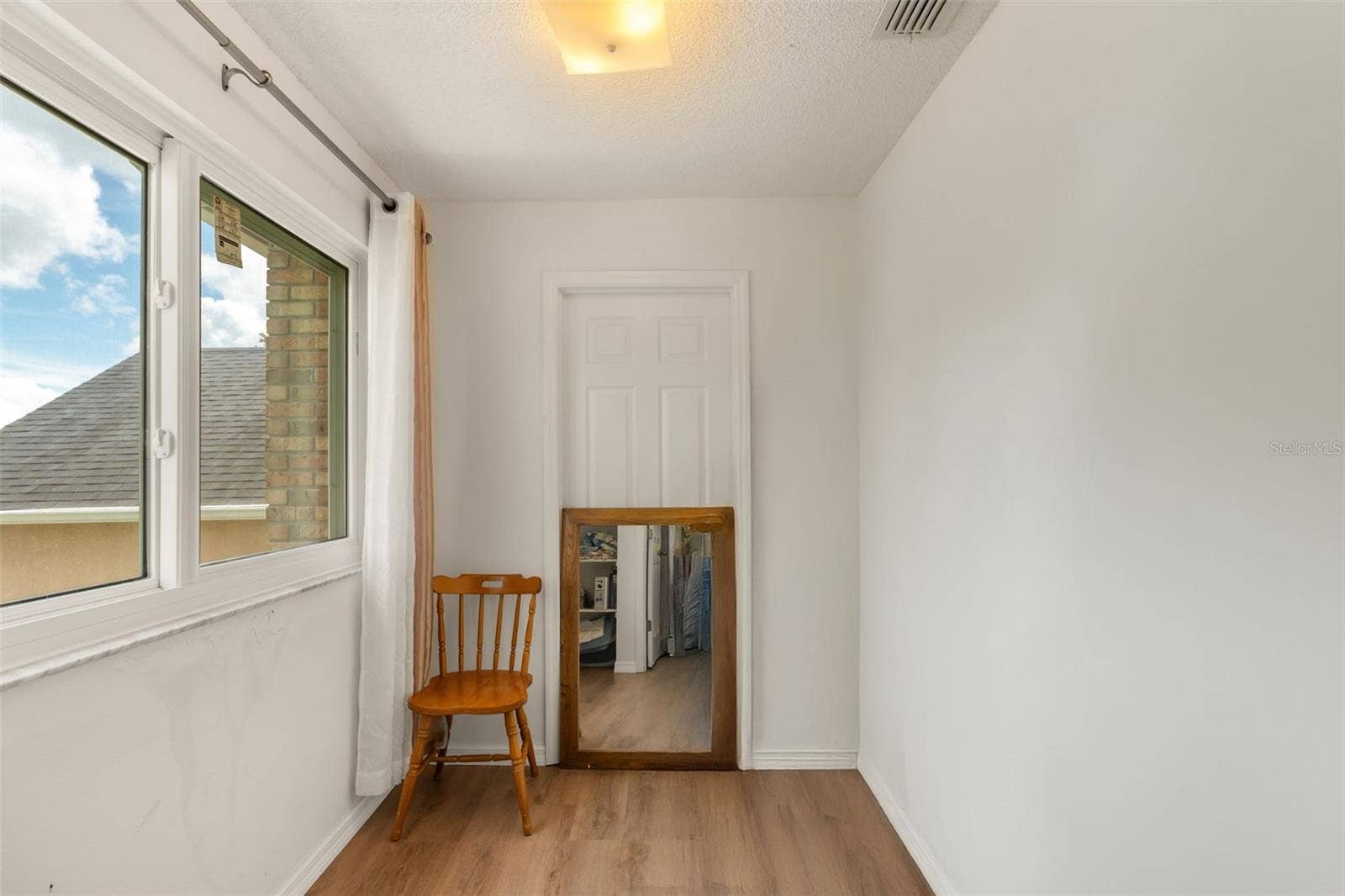 211 HUNT STREET, Clermont, FL 34711 Private flex room within the primary suite, ideal for an office, sitting room, nursery, or additional storage