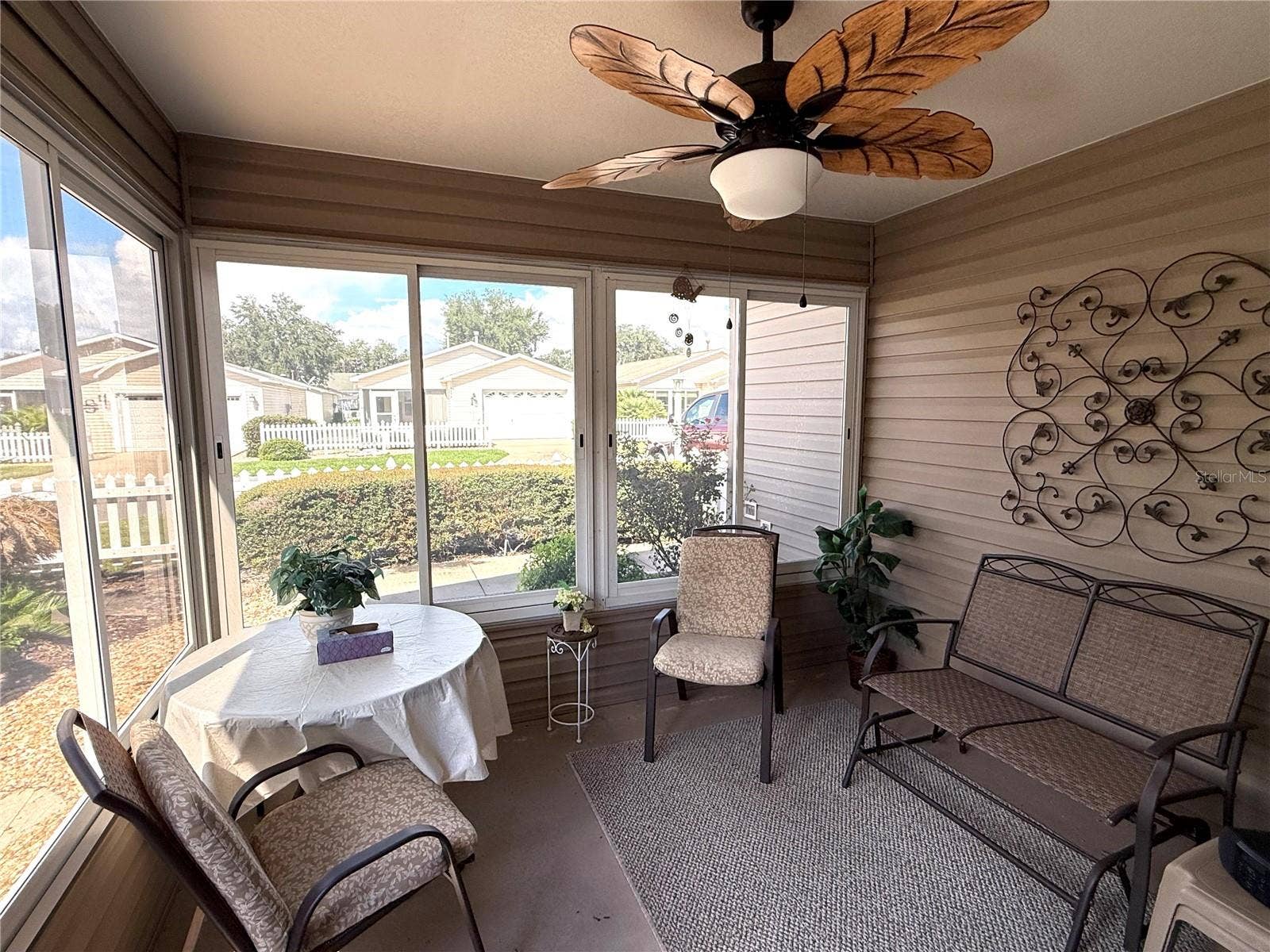 16878 SE 94TH SUNNYBROOK CIRCLE, The Villages, FL 32162 Front Acrylic enclosed Porch