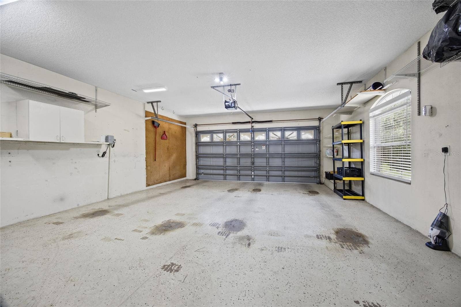 3081 E BERWICK COURT, Hernando, FL 34442 2 Car Garage with storage shelving