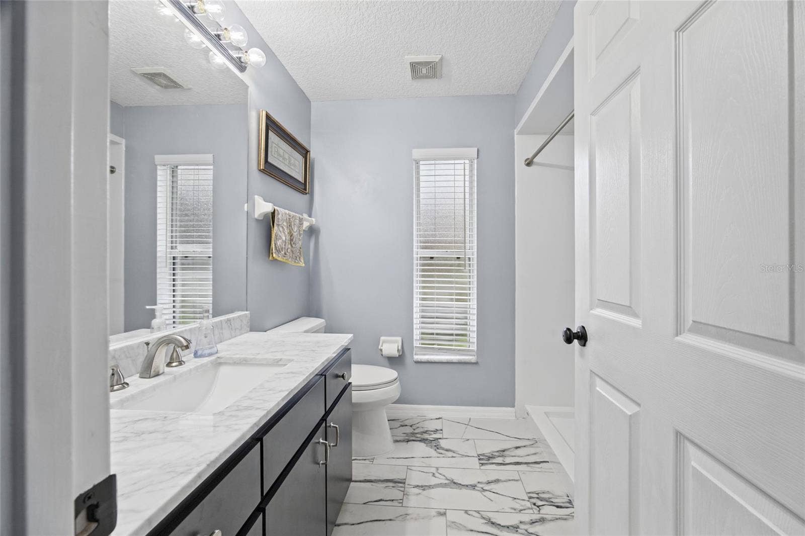 3081 E BERWICK COURT, Hernando, FL 34442 Guest bathroom with walk-in shower