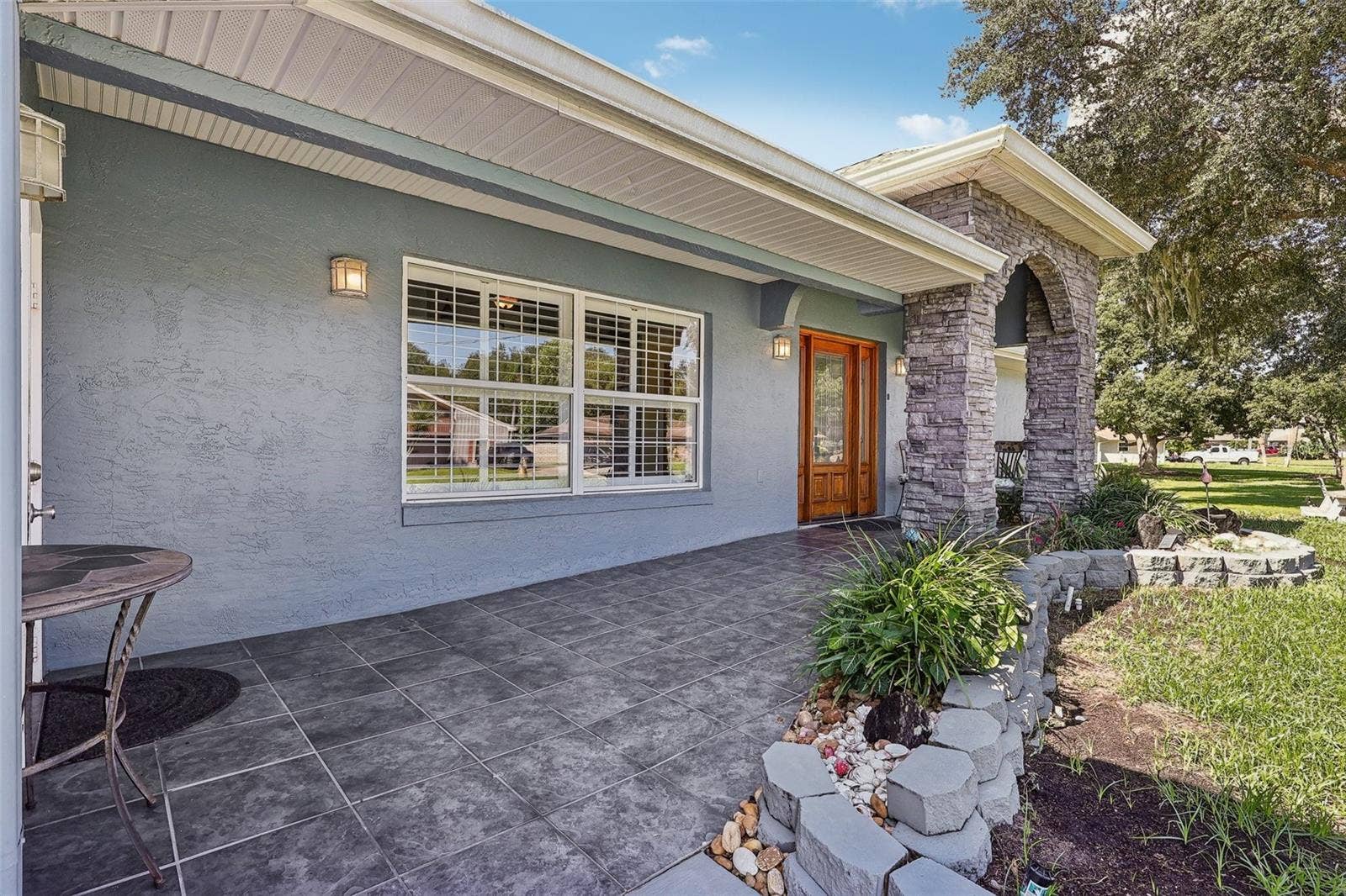 28116 LOIS DRIVE, Tavares, FL 32778 Front entryway main door also with door to garage on the left