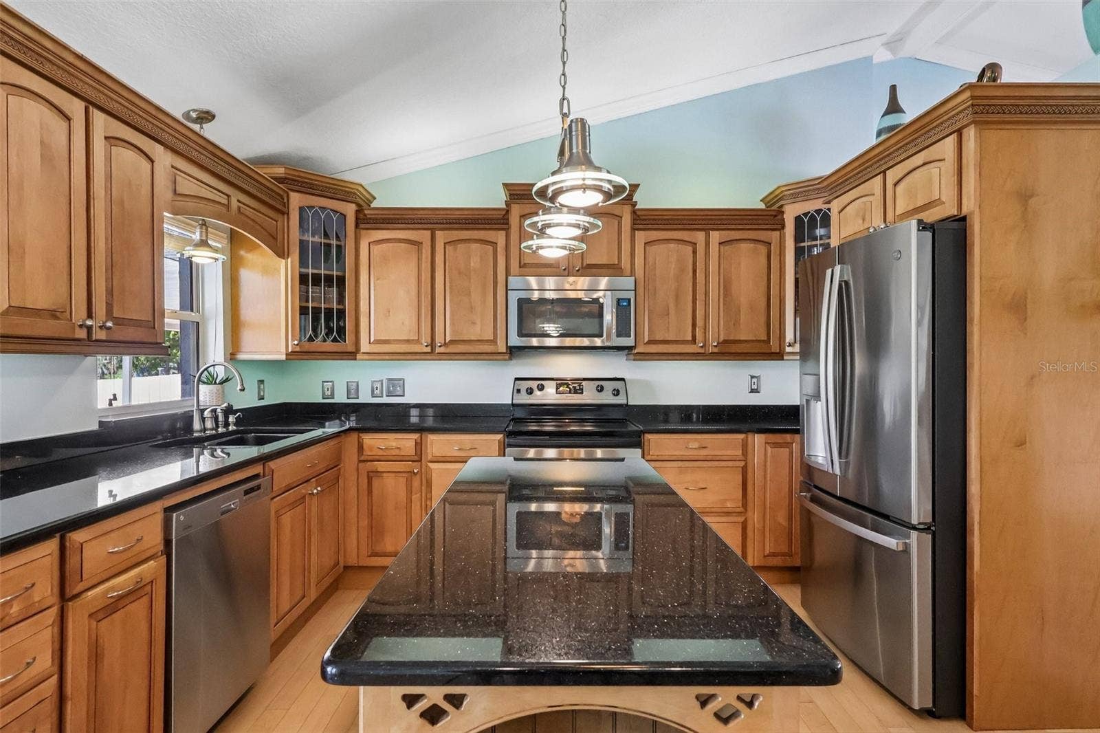 28116 LOIS DRIVE, Tavares, FL 32778 Beautiful Stone counter tops and solid wood kitchen cabinets with soft close features
