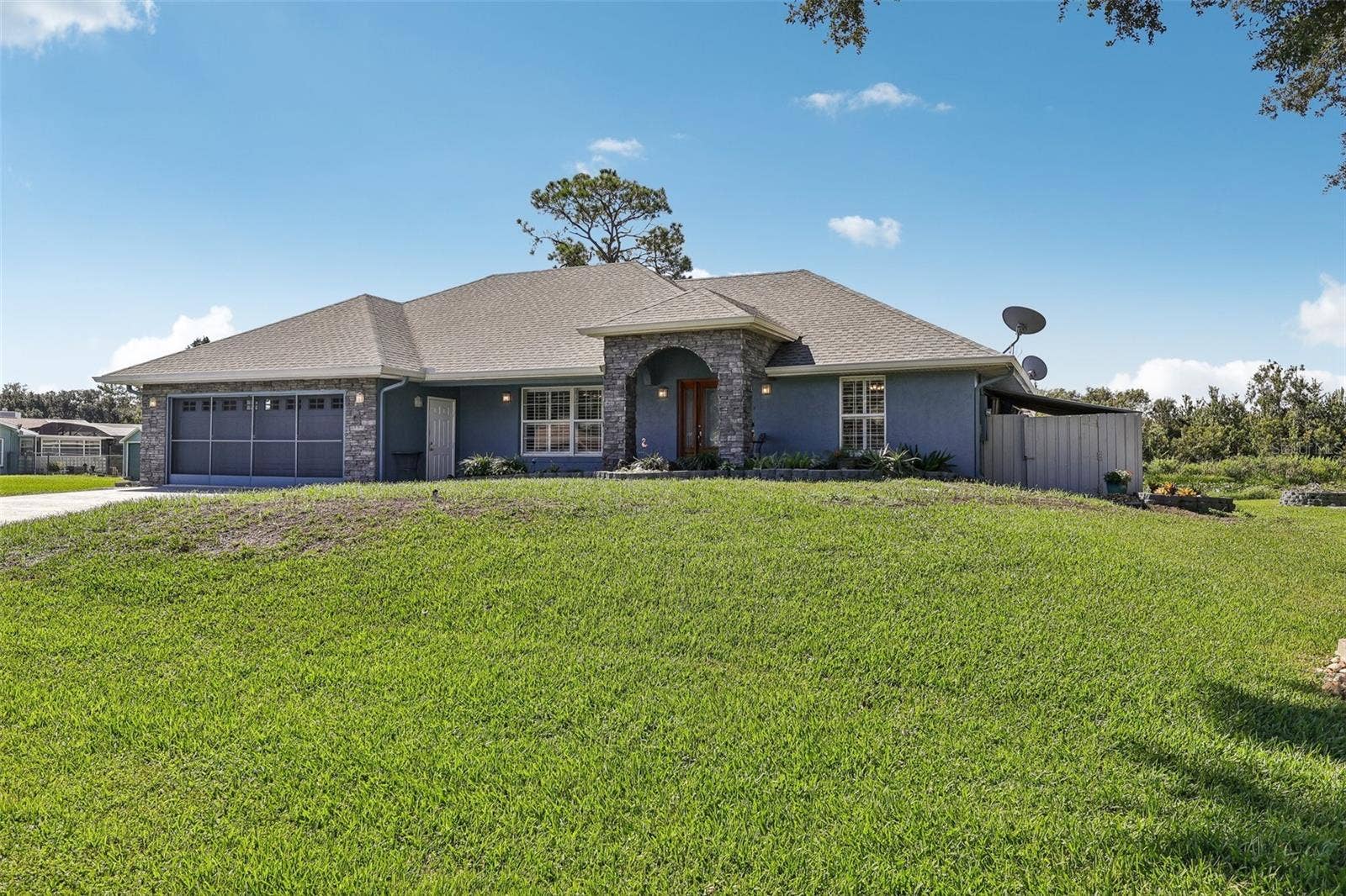28116 LOIS DRIVE, Tavares, FL 32778 Home sits high and dry