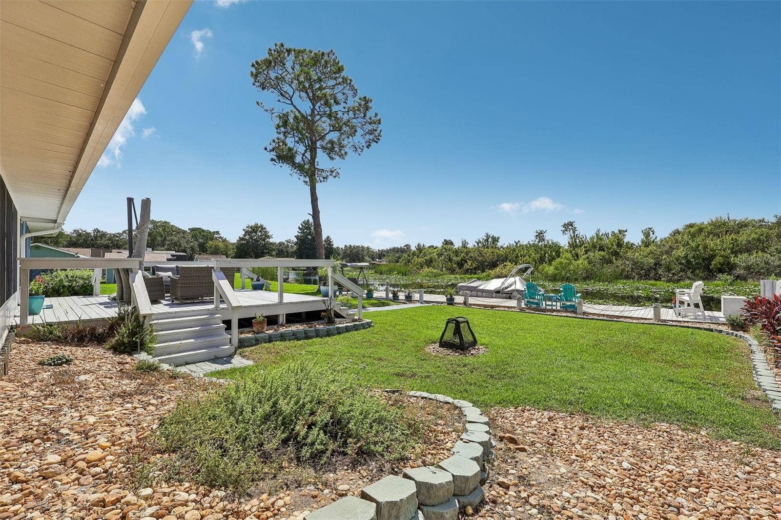 28116 LOIS DRIVE, Tavares, FL 32778 Canal leads to Lake Beauclaire, Lake Dora, Mount Dora and onto the Harris Chain of Lakes